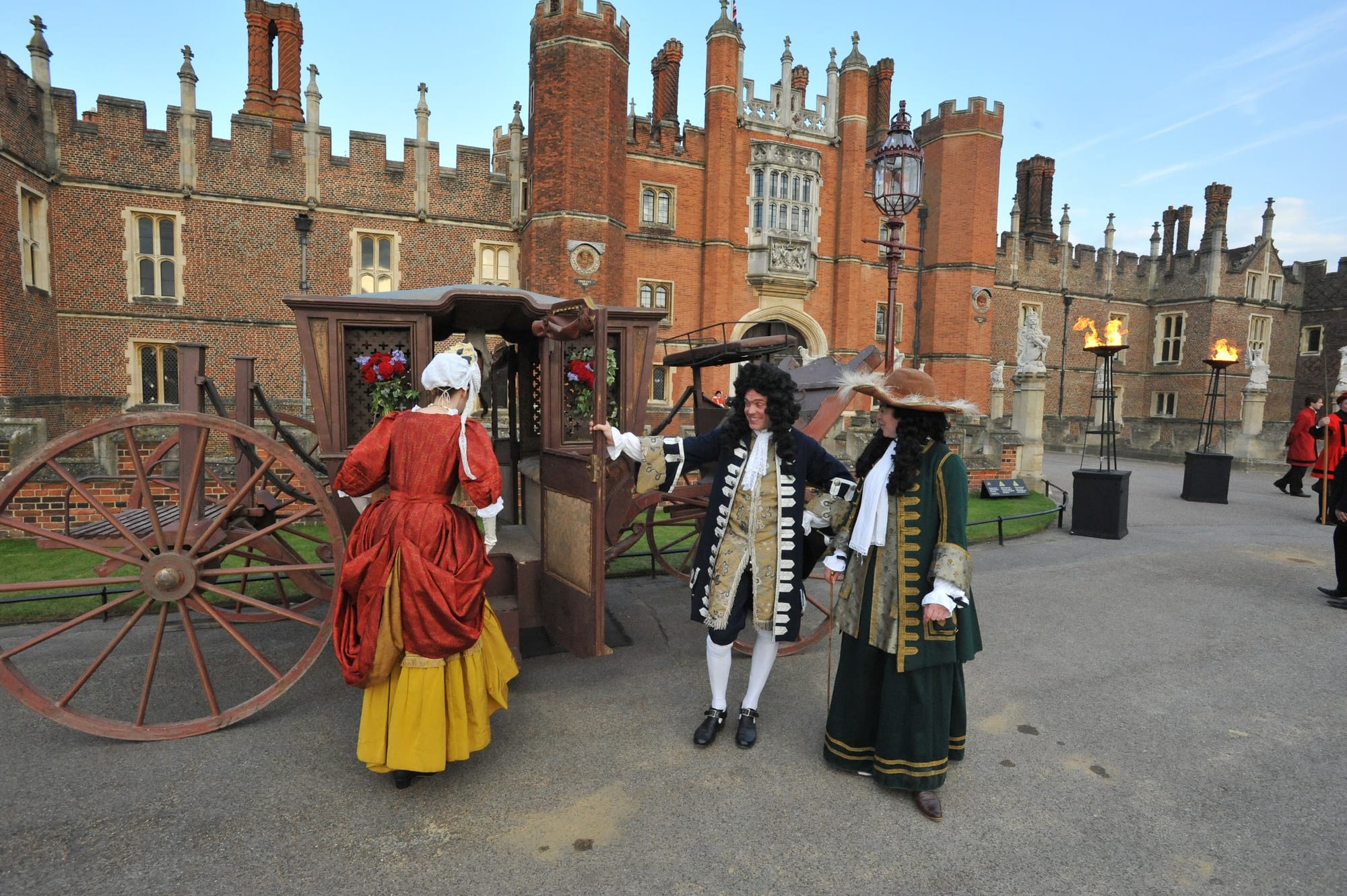 A period carriage and costumed performers at Hampton Court